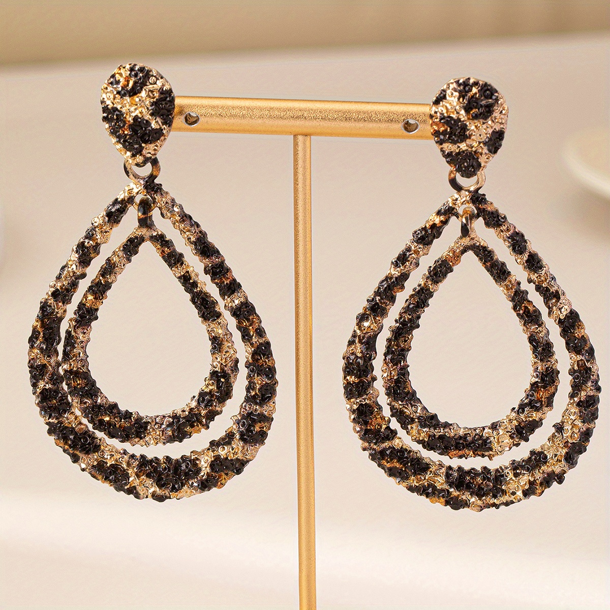 Leopard Print Teardrop Earrings with Golden Accents